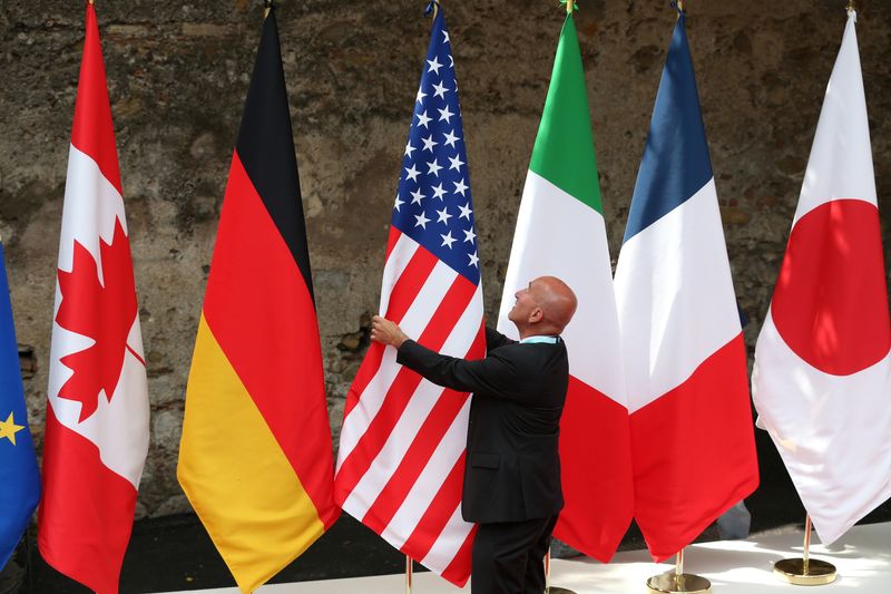 FILE PHOTO: Flags are placed at the G7 summit in