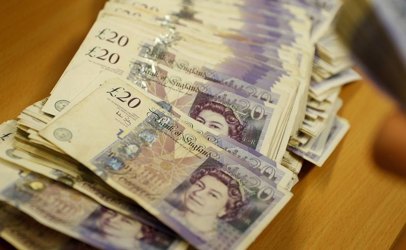 British Pound Sterling banknotes are seen at the Money Service