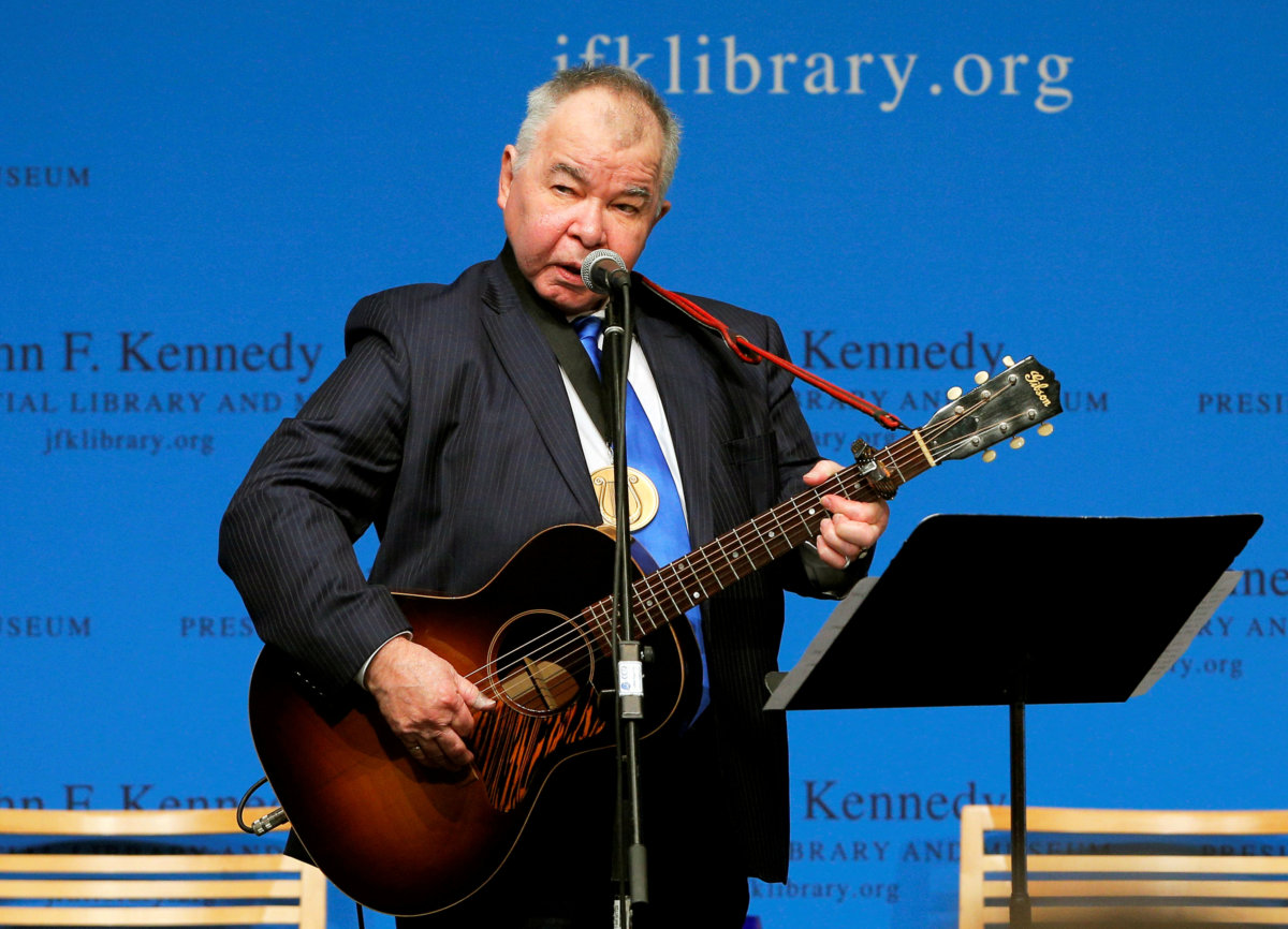 FILE PHOTO: Musician John Prine performs after accepting his PEN