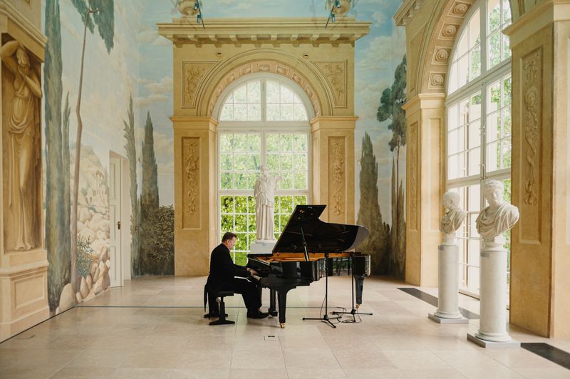 Pianist Karol Radziwonowicz plays Chopin’s concert during recording for online