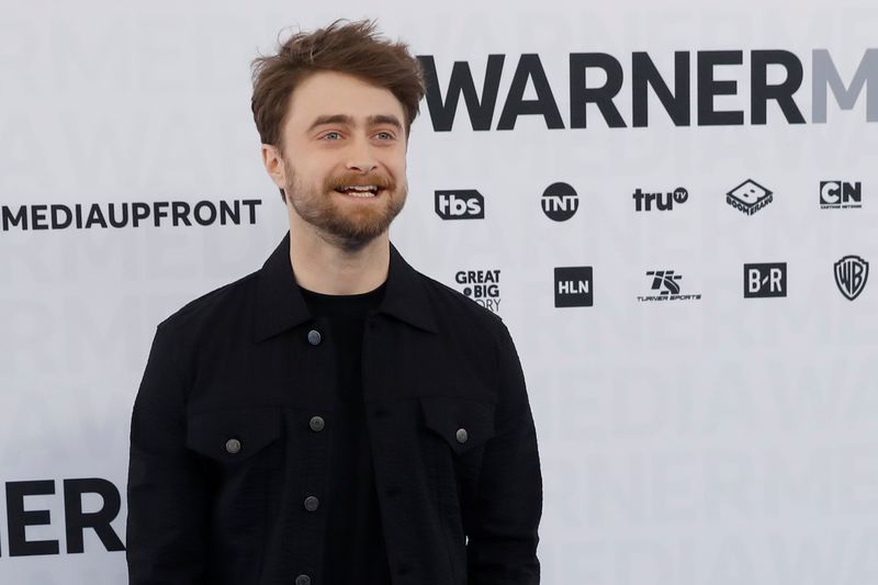 Actor Daniel Radcliffe poses as he arrives at the WarnerMedia
