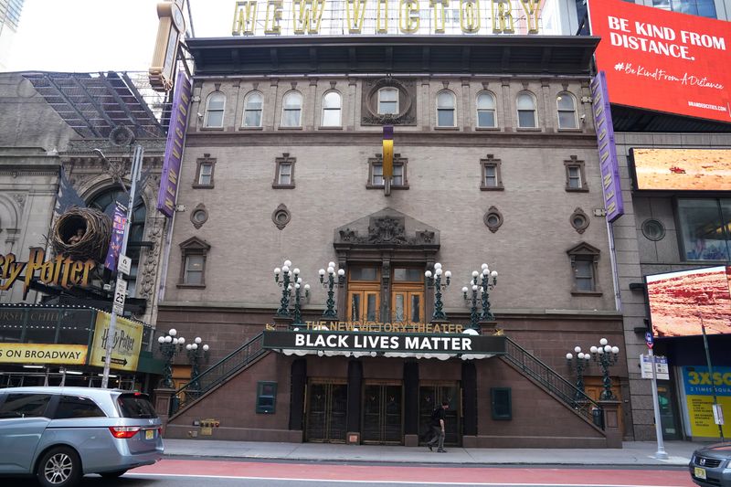 A shuttered theatre is pictured in Times Square in the