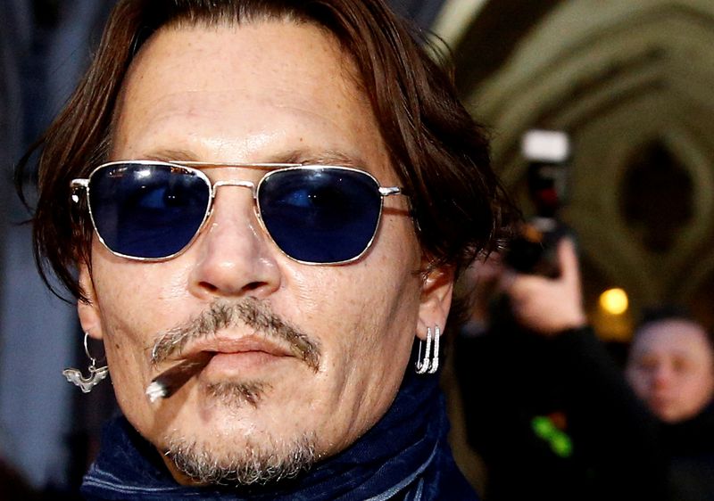 FILE PHOTO: Actor Johnny Depp leaves the High Court in