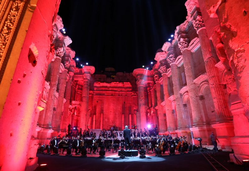 Musicians from Lebanon’s philharmonic orchestra are seen on stage before