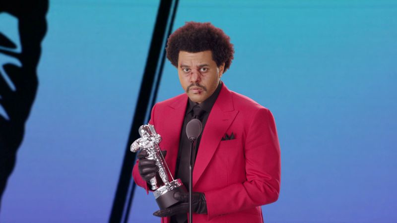 The Weeknd accepts the award for Best R&B during the