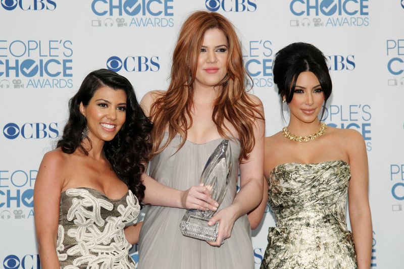 FILE PHOTO: Reality TV sisters Kourtney, Khloe and Kim Kardashian
