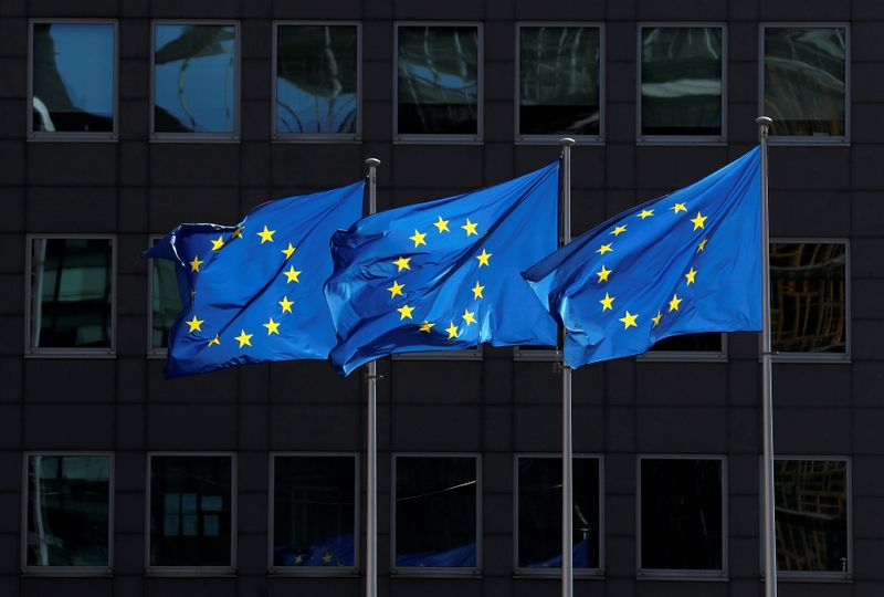 European Union flags flutter outside the European Commission headquarters in