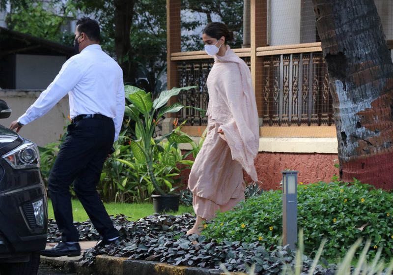 Bollywood actress Deepika Padukone leaves a guesthouse after she was