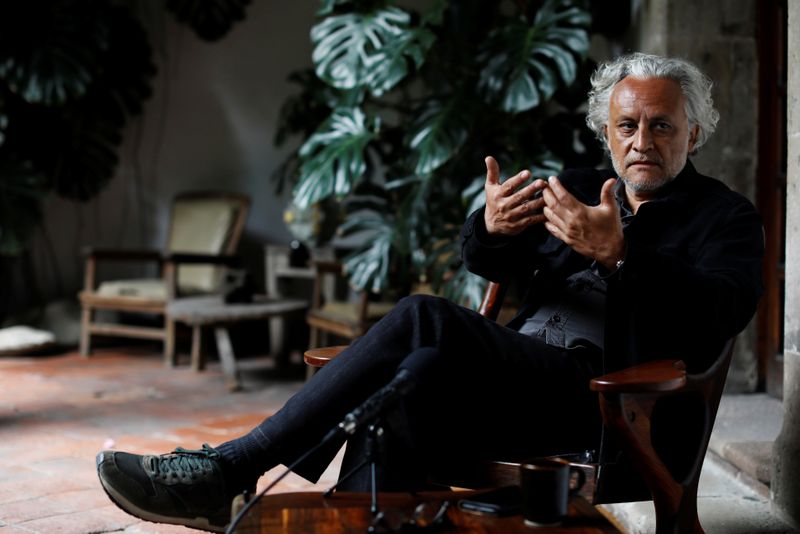 Mexican artist, Gabriel Orozco, gestures during an interview with Reuters