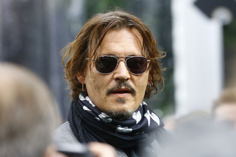 Actor Depp talks to the media at the 16th Zurich