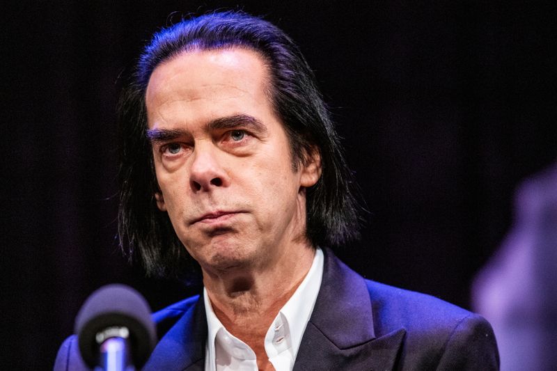 Australian artist Nick Cave attends a news conference to promote