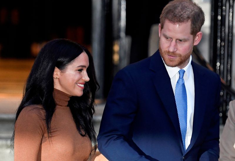 FILE PHOTO: FILE PHOTO: Britain’s Prince Harry and his wife