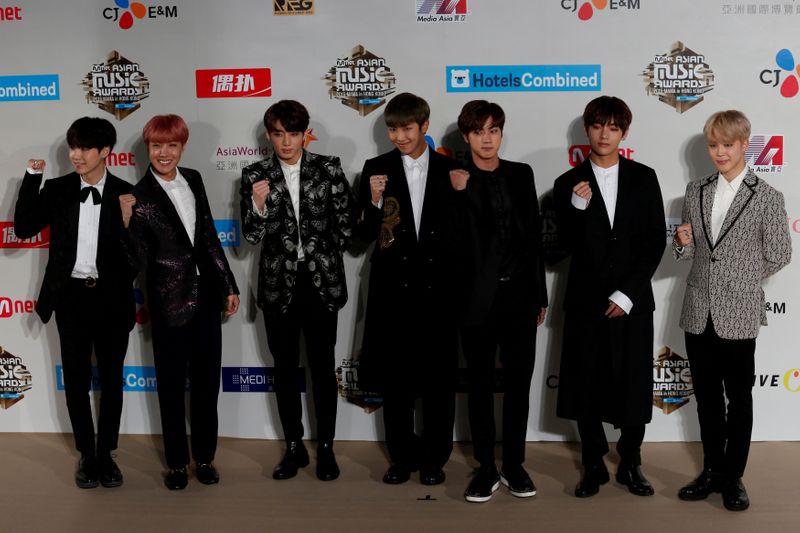 FILE PHOTO: Members of South Korean K-pop band BTS pose