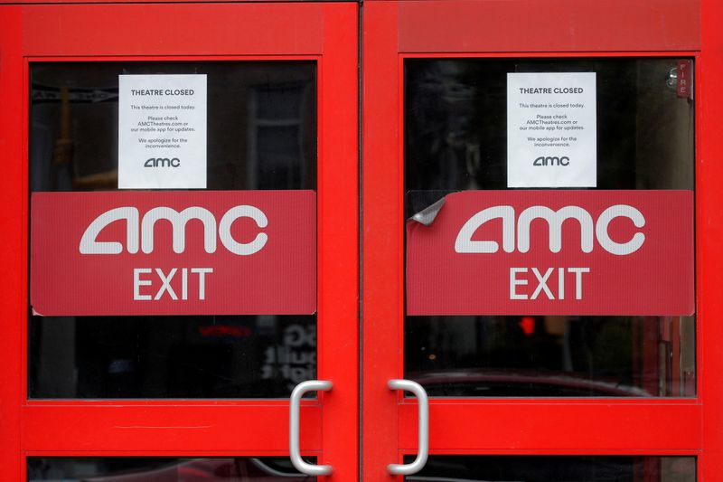 Closed signs are seen on an AMC Theatre during the