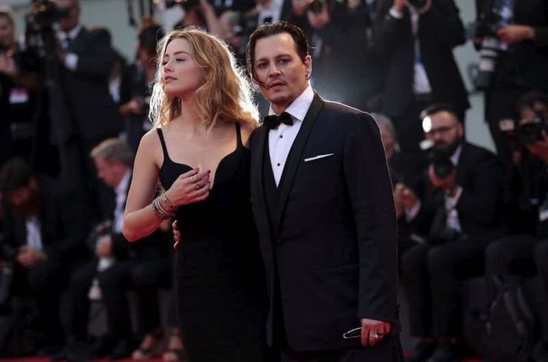 FILE PHOTO: Actor Depp and his wife Heard attend the