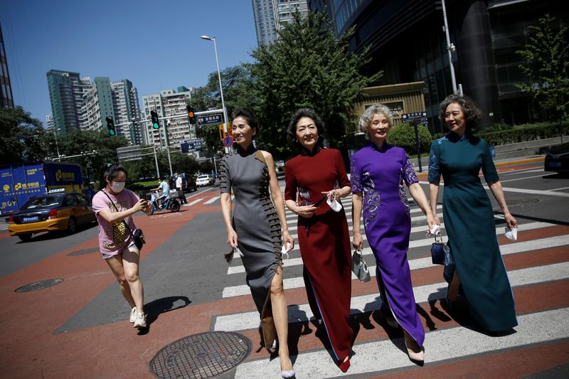 Elderly model group “Glamma Beijing” perform catwalk in Beijing’s CBD