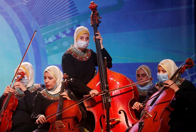 Members of Al-Nour Wal Amal (Light and Hope) chamber orchestra