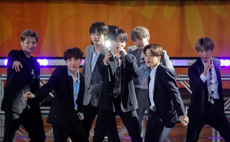 FILE PHOTO: Members of K-Pop band, BTS perform on ABC’s
