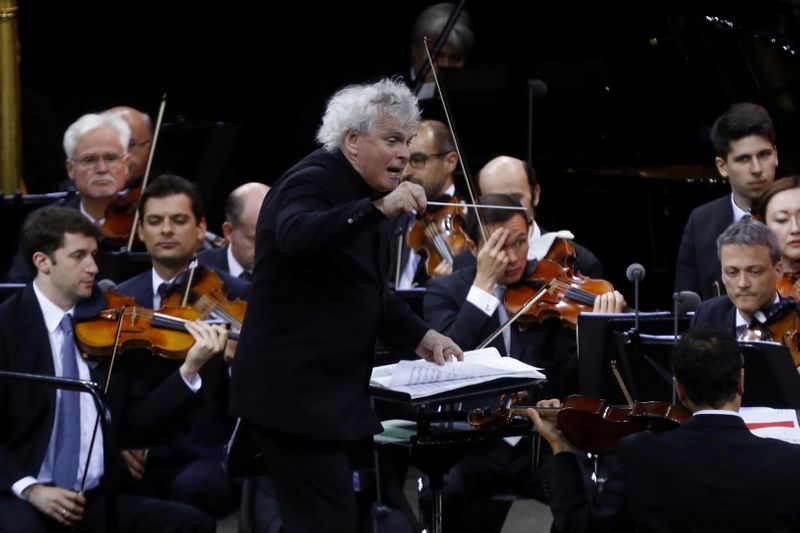 FILE PHOTO: British conductor Rattle gives his final concert as