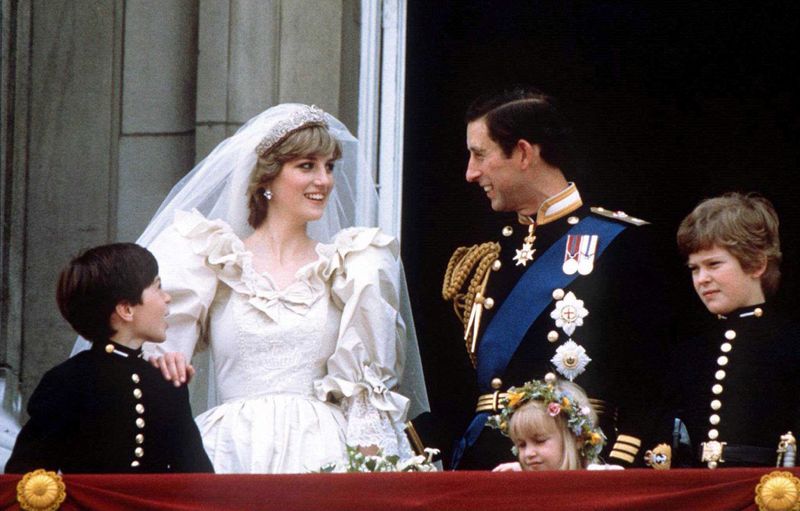 FILE PHOTO: Prince Charles and Princess Diana stand on the