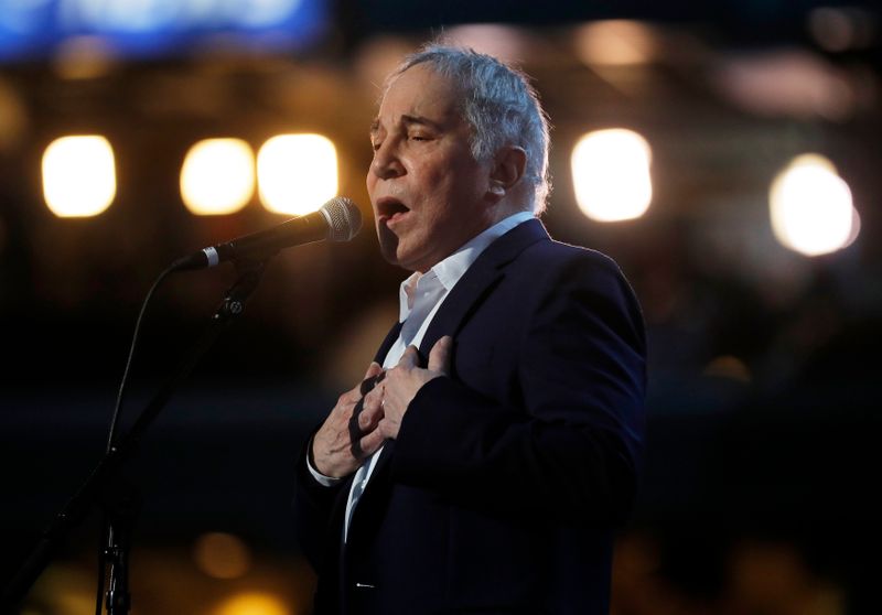 FILE PHOTO: Paul Simon performs during the Democratic National Convention
