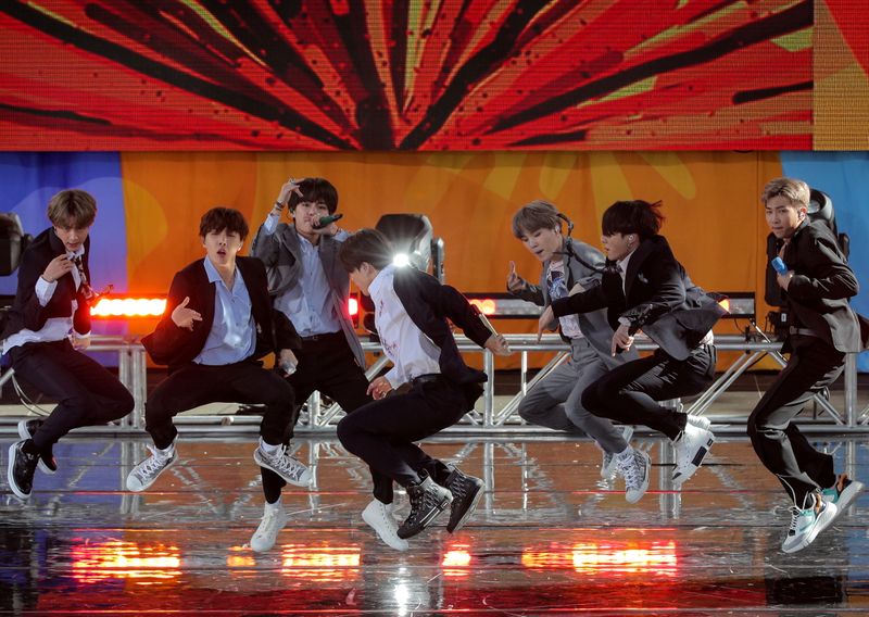 FILE PHOTO: Members of K-Pop band, BTS perform on ABC’s
