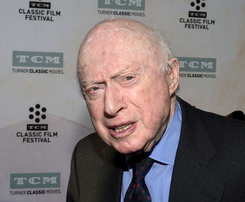 FILE PHOTO: Actor Norman Lloyd poses during 50th anniversary screening
