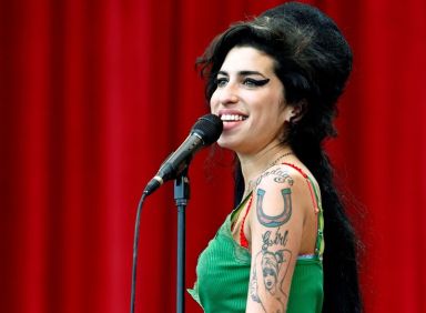 FILE PHOTO: British pop singer Winehouse performs during Glastonbury music