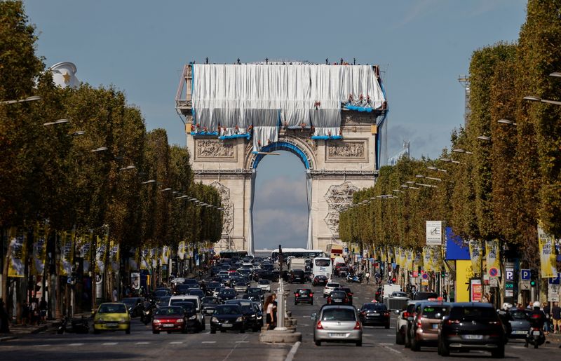 Arc de Triomphe enveloped by a shimmering wrapper in a