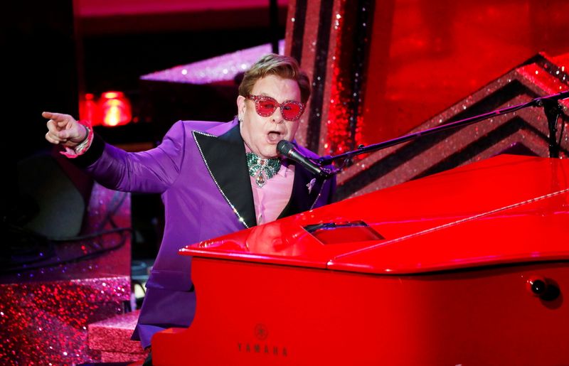 FILE PHOTO: Elton John performs at the 92nd Academy Awards