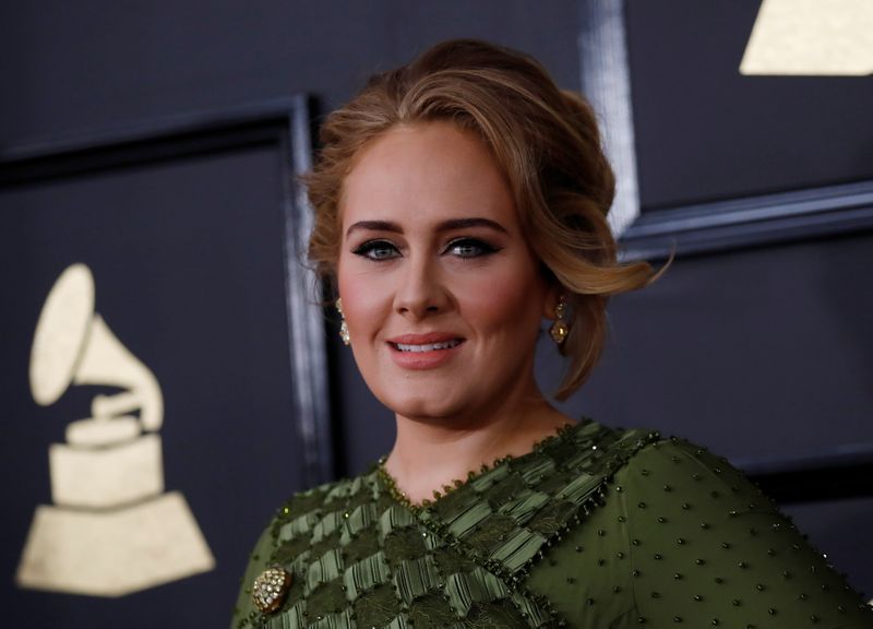 FILE PHOTO: Singer Adele arrives at the 59th Annual Grammy