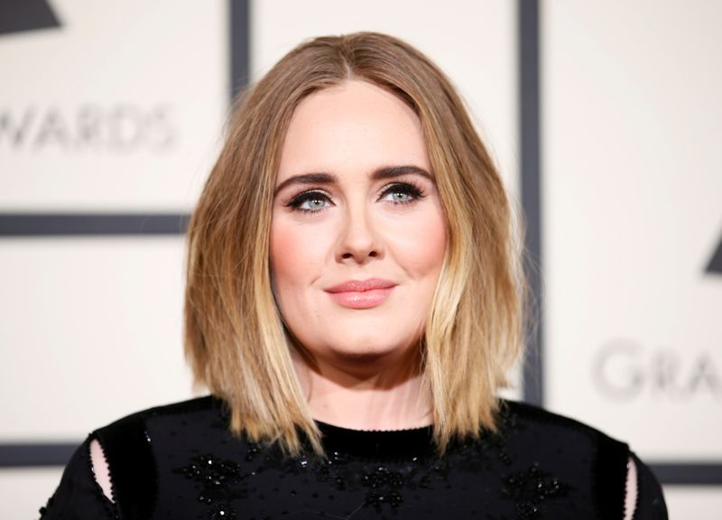 FILE PHOTO: Adele arrives at the 58th Grammy Awards in
