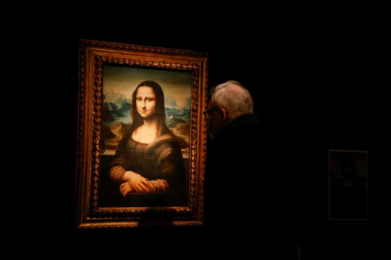 A visitor looks at a copy of the Leonardo da
