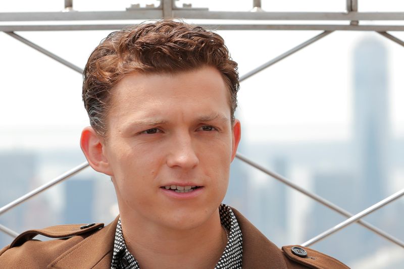 FILE PHOTO: Actor Tom Holland poses for a photograph on
