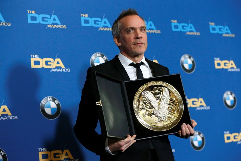 Director Vallee poses with the award for Outstanding Directorial Achievement