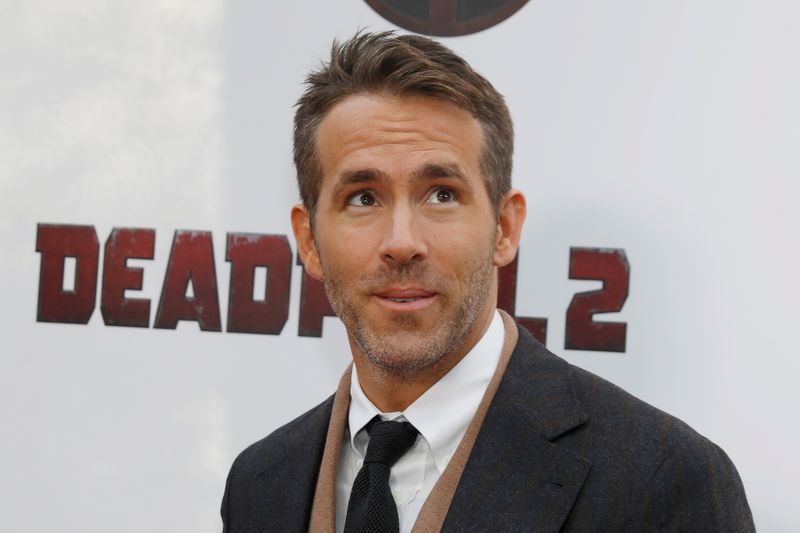 FILE PHOTO: Actor Ryan Reynolds poses on the red carpet