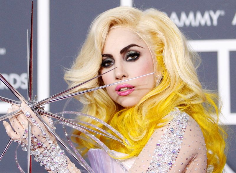 FILE PHOTO: Lady Gaga poses on the red carpet at