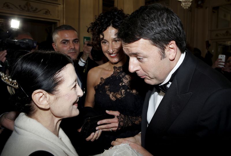 FILE PHOTO: Italian PM Renzi and his wife Agense meets