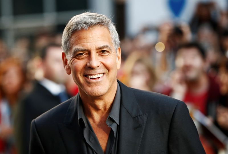 FILE PHOTO: Clooney arrives on the red carpet for the