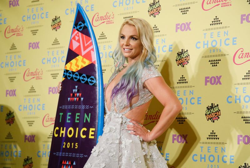 Singer Britney Spears poses backstage with her Choice Style Icon