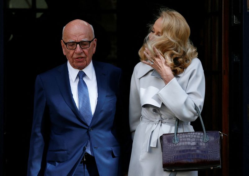 FILE PHOTO: Media mogul Rupert Murdoch and Jerry Hall pose