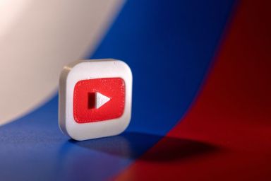 FILE PHOTO: Illustration shows Youtube logo and Russian flag