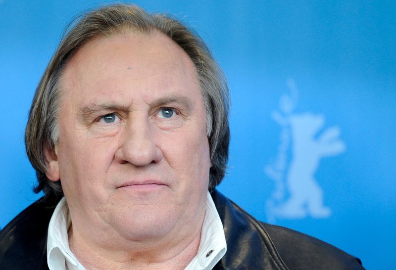 FILE PHOTO: Actor Depardieu poses during photocall at 66th Berlinale