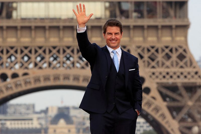 FILE PHOTO: Cast member Tom Cruise poses in front the