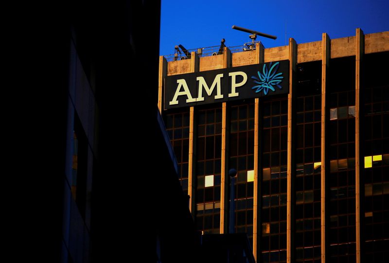 FILE PHOTO: The logo of AMP Ltd adorns its head