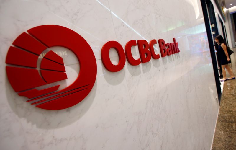 A woman walks into an OCBC Premier Banking branch in
