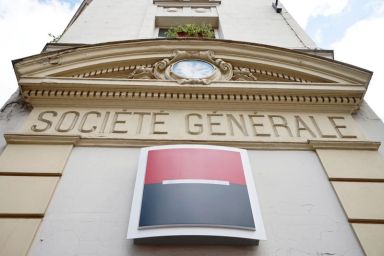 A Societe Generale sign is seen outside a bank building