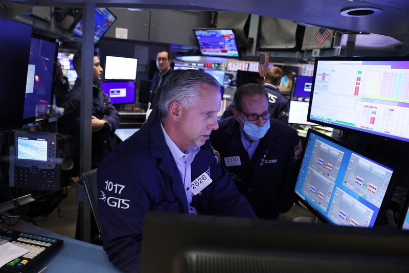Traders work on the trading floor at the New York
