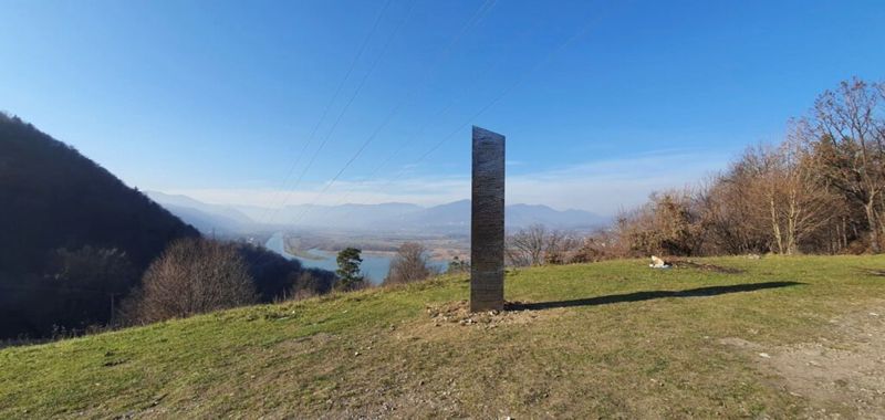 Metal monolith stands on the hills of Batca Doamnei, near