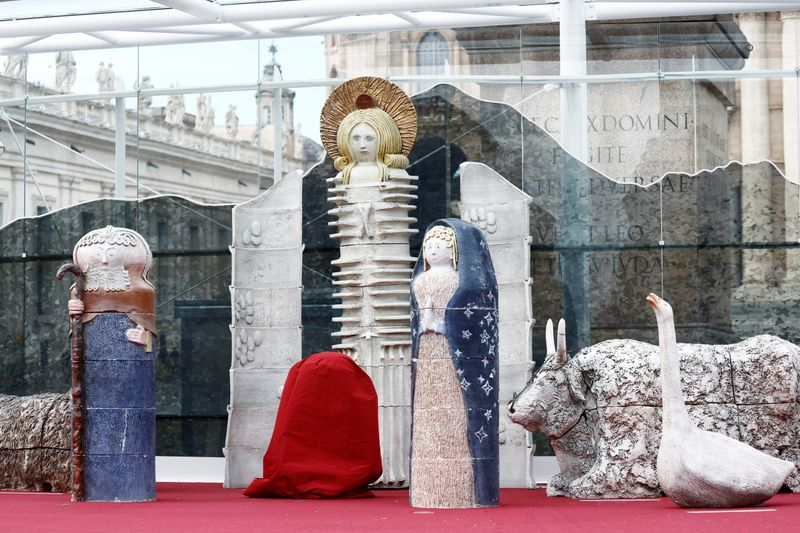 Nativity scene figurines are seen displayed at the Vatican